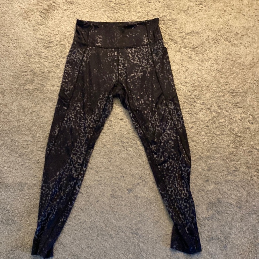 Black animal print leggings with pocket. Only worn a handful of times